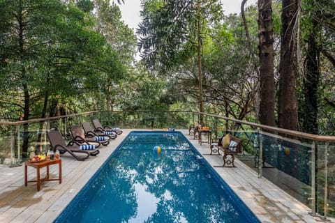 SaffronStays Odeon - art-deco heritage home with heated pool, private forest lawn and terrace Villa in Lonavla