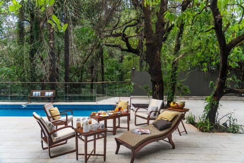 SaffronStays Odeon - art-deco heritage home with heated pool, private forest lawn and terrace Chalet in Lonavla