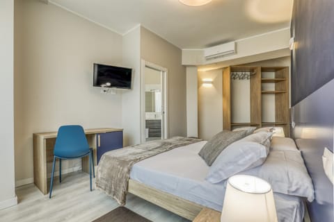 Bed, TV and multimedia, wardrobe, air conditioner