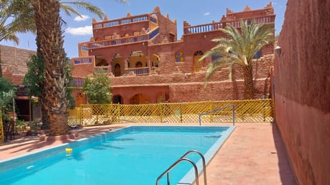 Property building, Patio, Pool view, Swimming pool