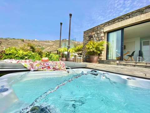 Property building, Patio, Day, Natural landscape, Hot Tub, Mountain view, Pool view, sunbed