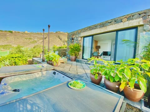 Patio, Spring, Day, Natural landscape, Garden, Hot Tub, Garden view, Mountain view, Pool view, sunbed