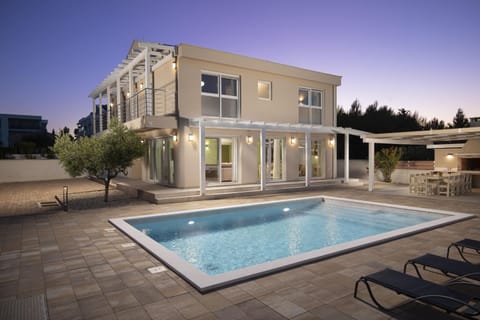 Property building, Night, Swimming pool, sunbed