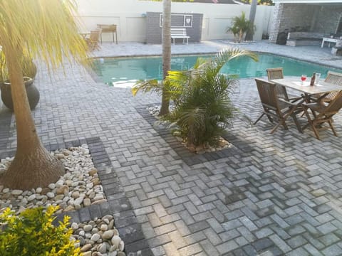 Patio, BBQ facilities, Swimming pool