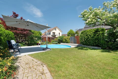 Property building, Living room, Swimming pool