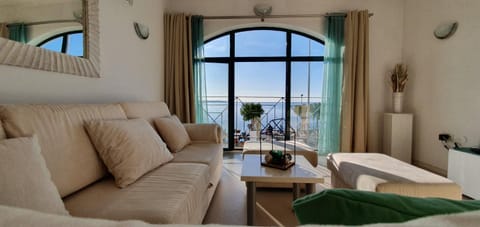 Natural landscape, Living room, Seating area, Sea view