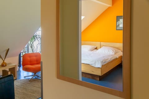 Bed, Seating area, Bedroom