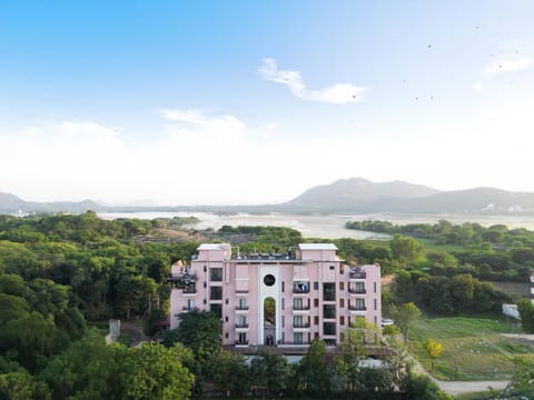 Property building, Nearby landmark, Day, Natural landscape, Lake view, Mountain view