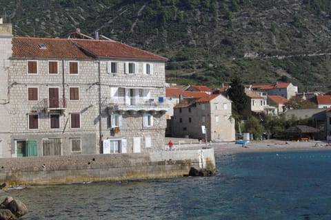 Apartments by the sea Komiza, Vis - 9703 Condo in Komiža