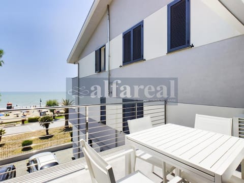 Property building, View (from property/room), Balcony/Terrace, Seating area, Sea view