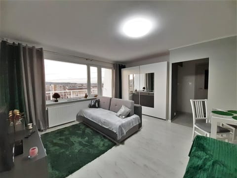 Bed, TV and multimedia, Living room, Seating area, Bedroom