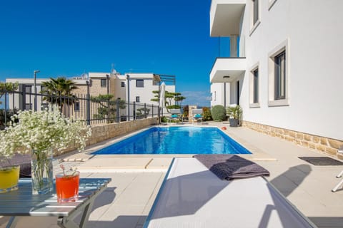 Property building, Day, Pool view, Swimming pool