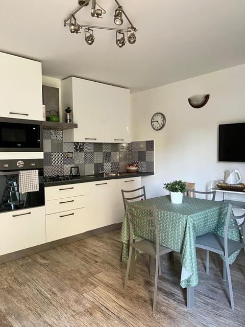 Kitchen or kitchenette, dishwasher, microwave, oven