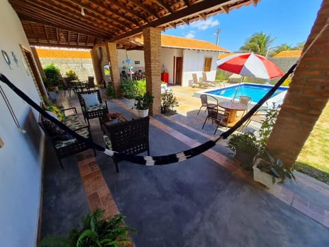 Patio, Day, Pool view, sunbed