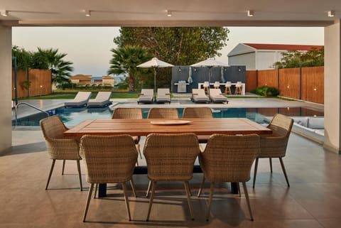 Patio, Day, Dining area, Pool view, Swimming pool, sunbed