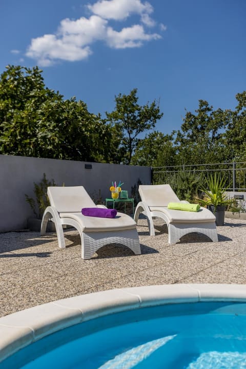 Newly refreshed property JOVI-relaxing, fenced, private, heated pool & view House in Split-Dalmatia County