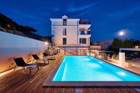 Property building, Swimming pool, Sunset, sunbed