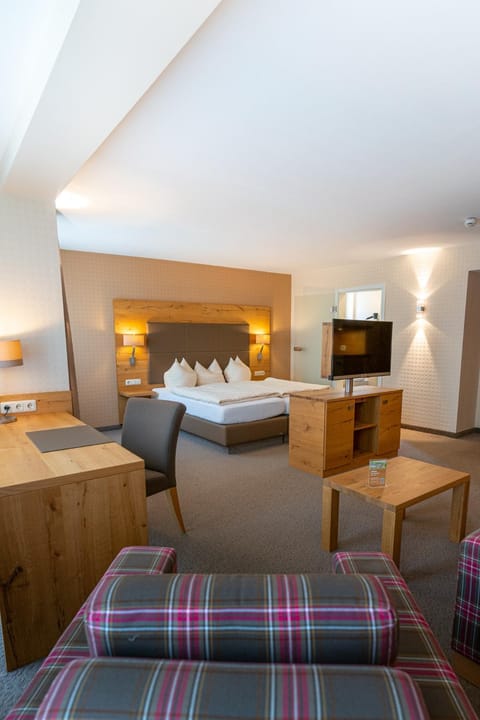 Bed, Living room, Seating area, Bedroom