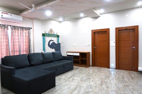 Property building, Living room, Seating area, air conditioner