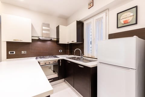 Kitchen or kitchenette, oven