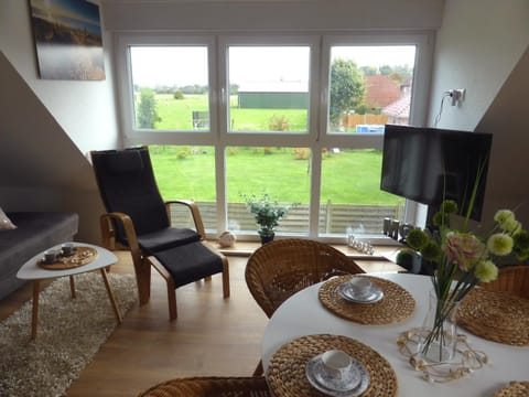 View (from property/room), Living room, Seating area, Garden view