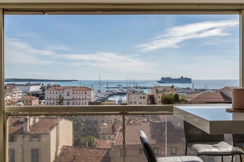 Admire Panoramic Ocean Views Through Walls of Windows Apartment in Cannes