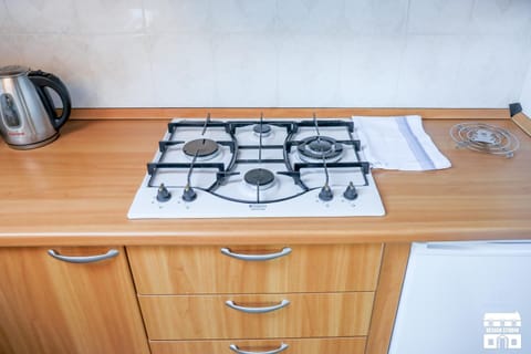 Kitchen or kitchenette, stove