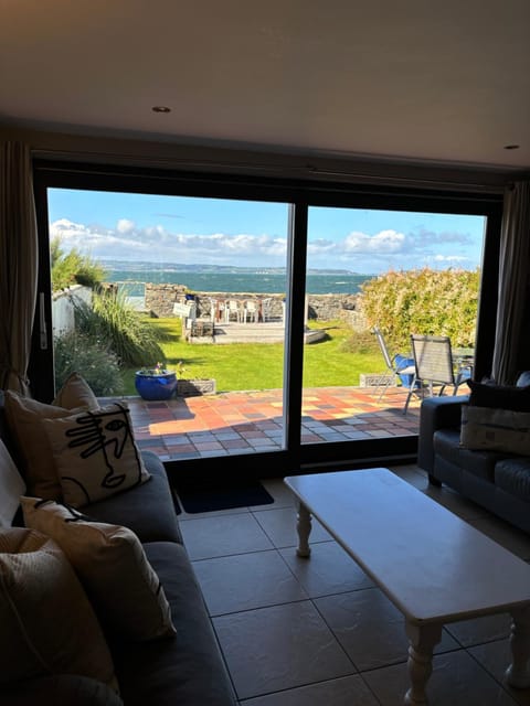 Splash Cottage beach house with Sea lapping Garden House in Northern Ireland