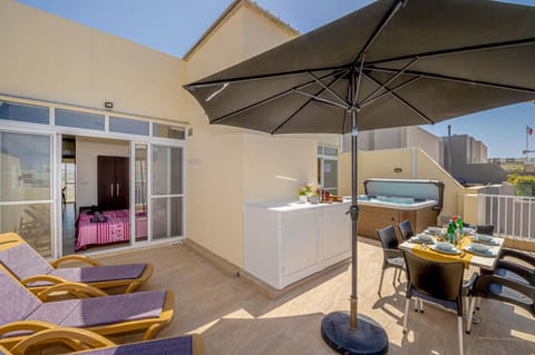 Summer Breeze Penthouse with private Hot Tub & terrace with panoramic views, by Getawaysmalta Condo in Saint Paul's Bay