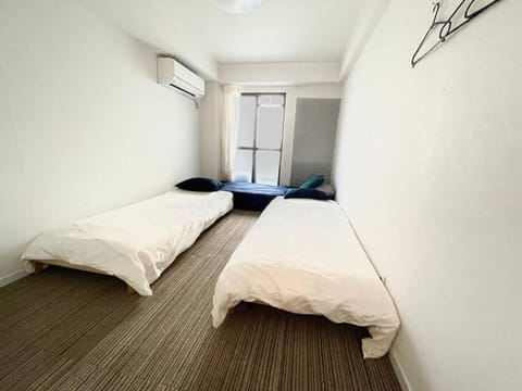 SIMPLY WHiTE GUEST ROOM302 Condo in Osaka