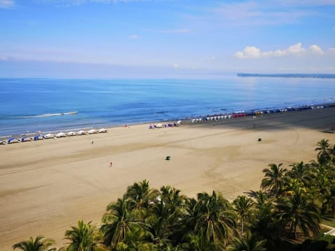 Property building, Nearby landmark, Day, People, Natural landscape, Beach, Sea view