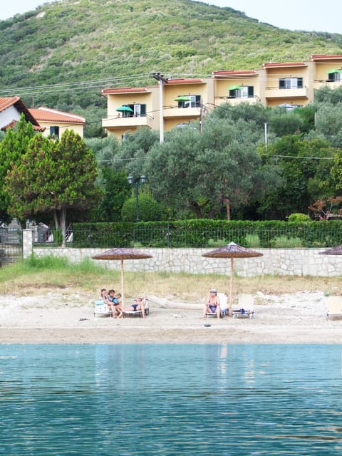 Property building, Day, People, Natural landscape, Beach, sunbed