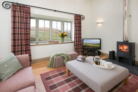 Property building, TV and multimedia, View (from property/room), View (from property/room), Living room, Seating area, flat iron