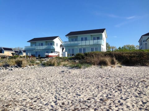 Property building, Day, Natural landscape, Beach, Sea view