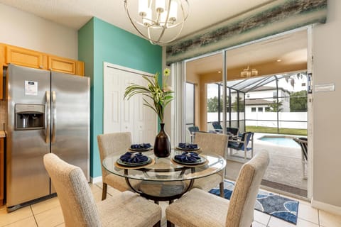 Kitchen or kitchenette, Seating area, Dining area, Pool view