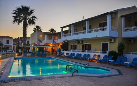 Property building, Swimming pool, Sunset