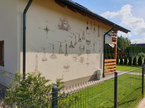 OSADA CZTERY PORY ROKU -DOM LATO House in Pomeranian Voivodeship