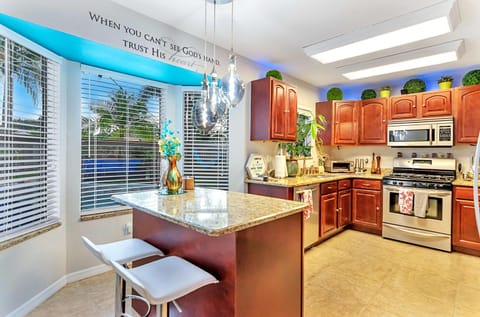 Urban Oasis withHot Tub, HEATED POOL and Private Movie Theater home House in Merritt Island