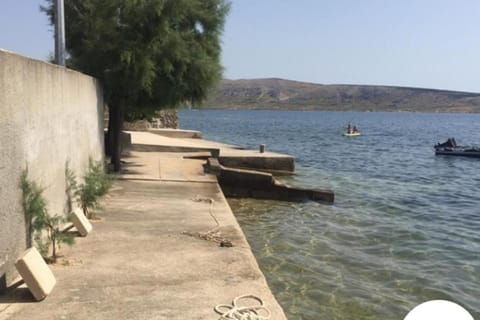 Apartments by the sea Kustici, Pag - 18248 Condo in Novalja
