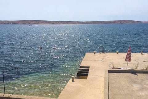 Apartments by the sea Kustici, Pag - 18248 Condo in Novalja