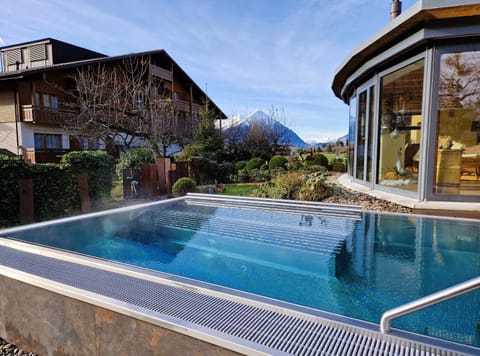 Property building, Day, Hot Tub, Mountain view, Pool view, Swimming pool