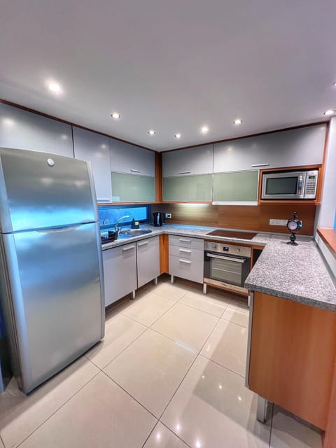 Kitchen or kitchenette, oven, stove