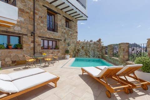 Property building, Living room, Swimming pool