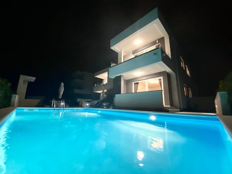Property building, Night, Balcony/Terrace, Pool view, Swimming pool, sunbed