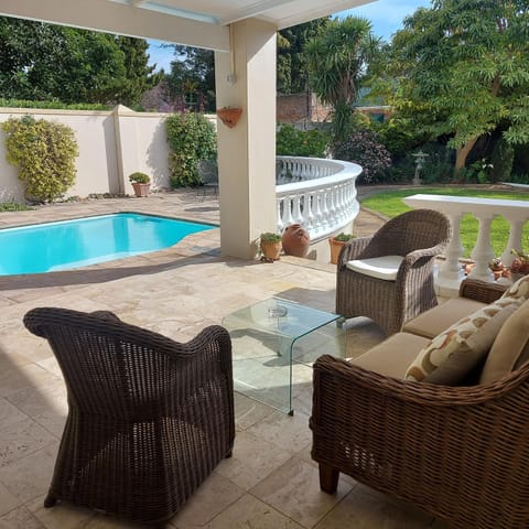 Patio, Lounge or bar, Seating area, Pool view, Swimming pool