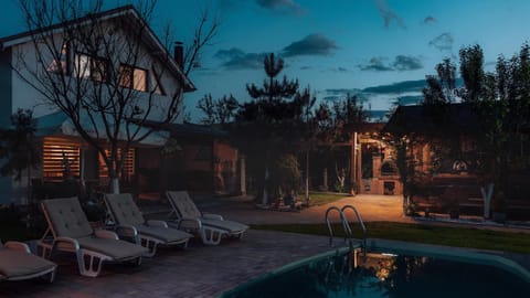 Property building, Night, Pool view, Swimming pool