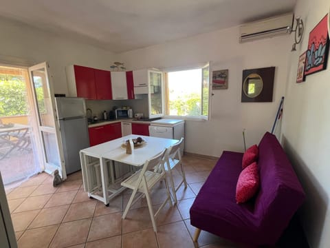 Dining area, stove, kitchen, air conditioner