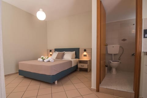 Shower, Toilet, Bed, Bedroom