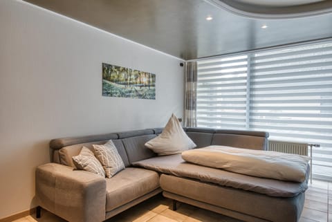 Bed, Living room, Seating area