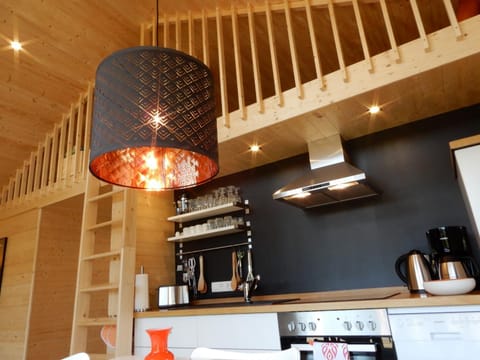 Day, Property logo or sign, Property logo or sign, Winter, Summer, Coffee/tea facilities, Kitchen or kitchenette, Living room, Photo of the whole room, Decorative detail, Seating area, Dining area, On site, Text overlay, Garden view, Family